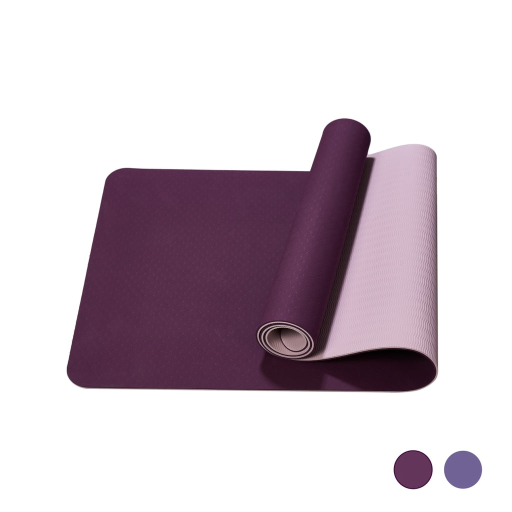 Purple yoga mat used for home stretching and floor exercises
